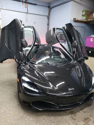 Black McLaren supercar at Hollywood Sound Ann Arbor